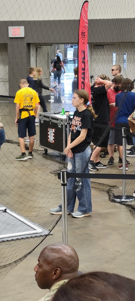 Ashley Shindorf preparing to guide Nick through the drone course
