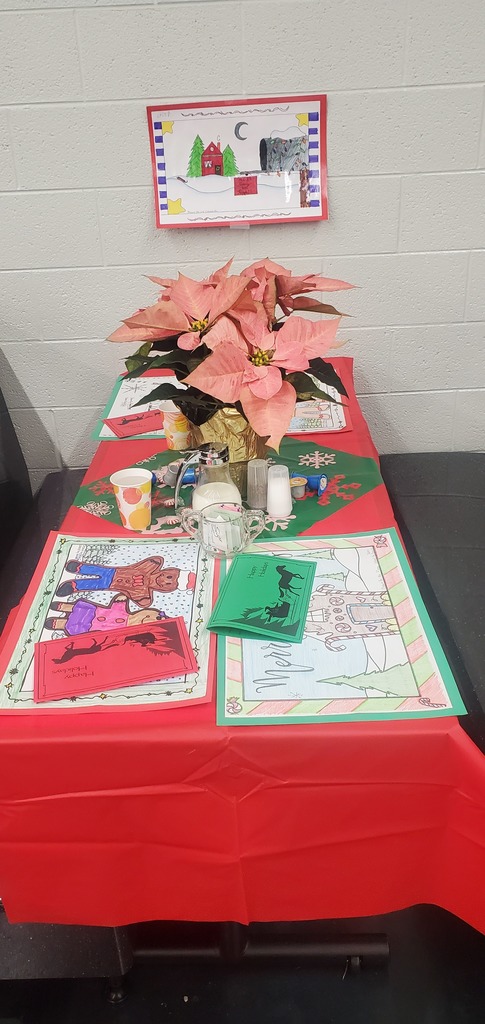 tables were decorated with placemats drawn and colored by 6-12 students